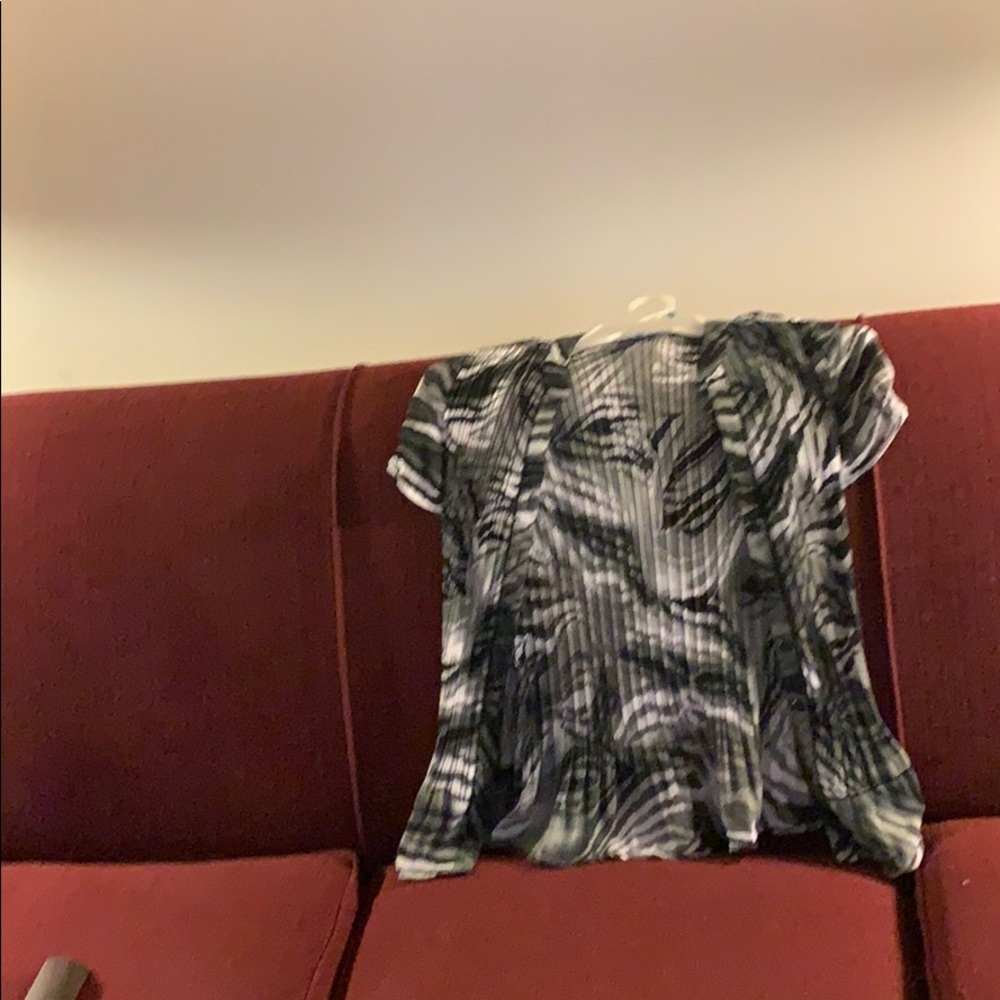 This blouse buttons down the front